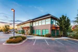 a photo showcasing parking lot weed control services offered in the Twin Cities metro area.